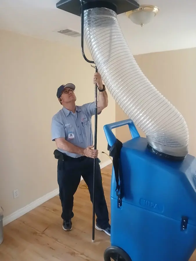 Mini Split Installation technician using HEPA equipment in Gardner